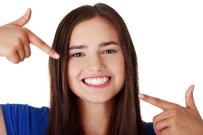 Коррекция зубов без брекетов